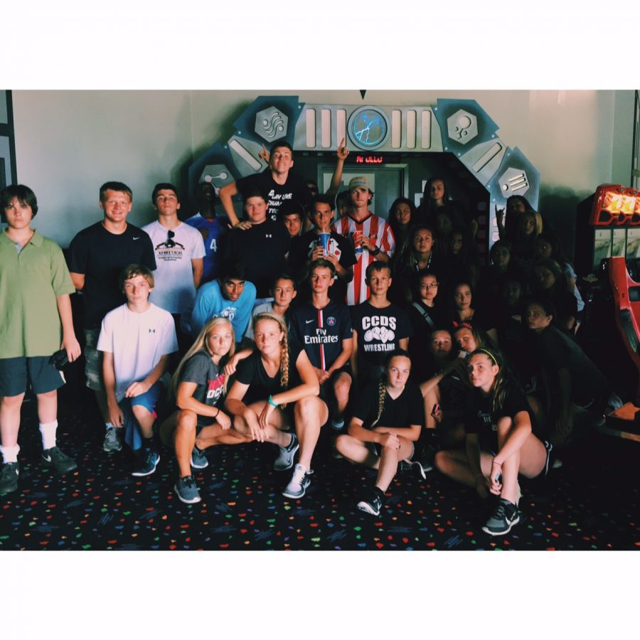 The girls and boys soccer teams after playing laser tag as a team building exercise. 